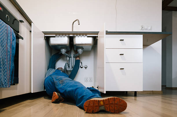 Professional Drain Cleaning technician working in Irving, TX